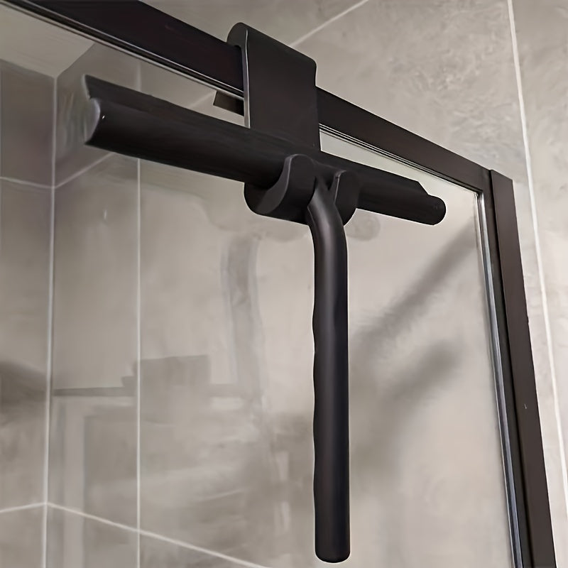 A Household Silicone Squeegee for Cleaning Windows And Bathrooms, Ideal for Shower And Glass Surfaces.