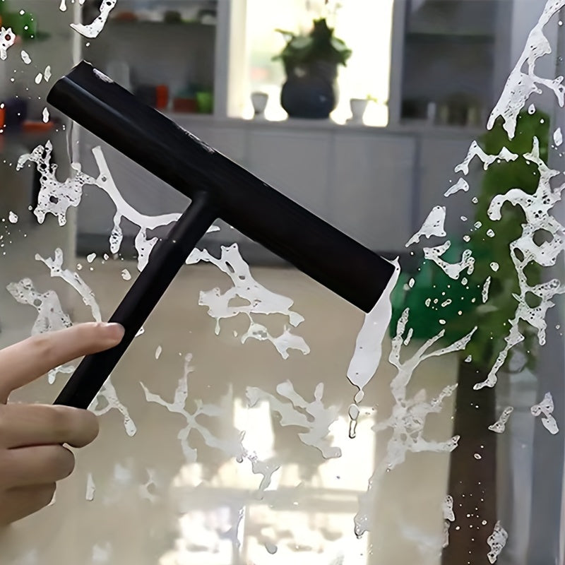 A Household Silicone Squeegee for Cleaning Windows And Bathrooms, Ideal for Shower And Glass Surfaces.